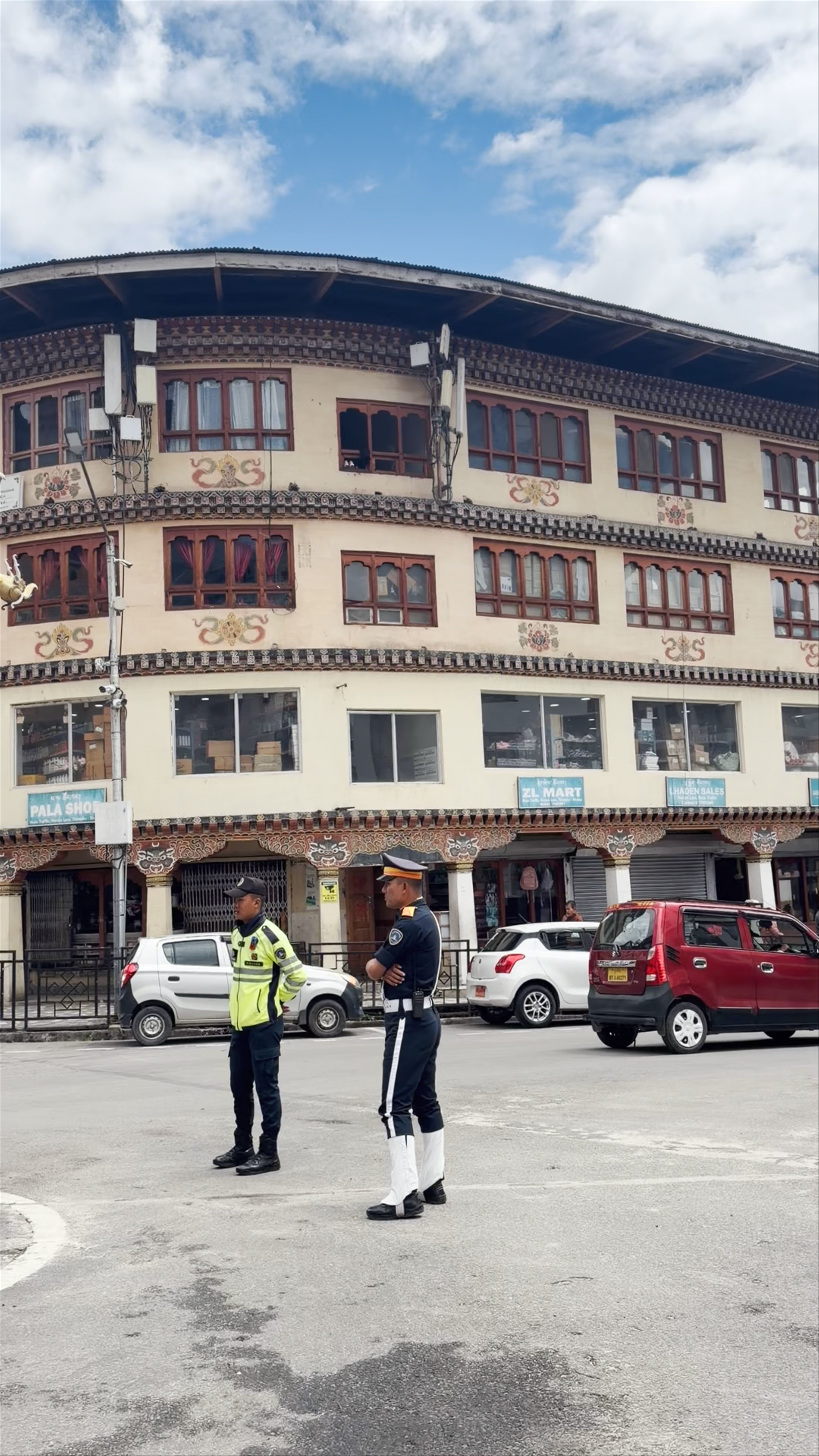 Vibrant Street Life at Norzin Lam Traffic Booth in Thimphu, Bhutan