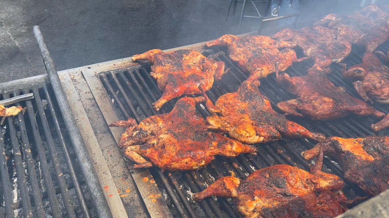 Pollos El Dorado - Seasoning the Chicken - Mexican Near Me - Las Vegas, Nevada