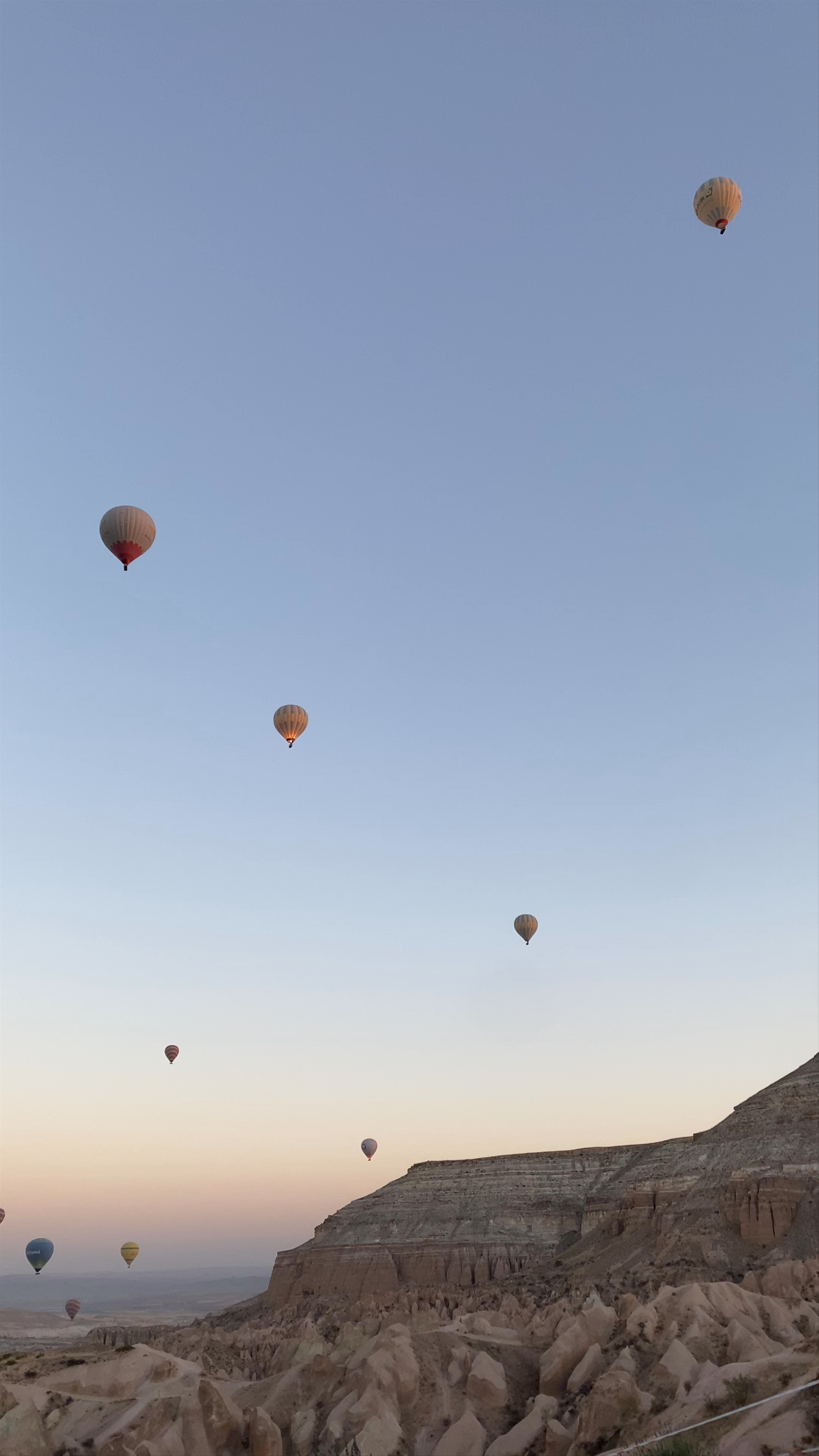Sunrise Hot Air Balloon Experience over Cappadocia's Kızılçukur Valley