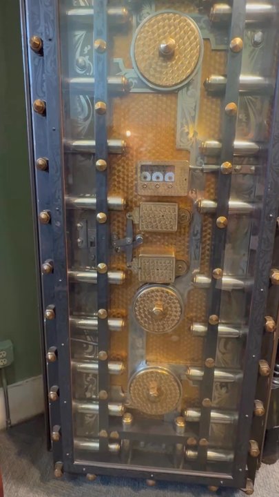 Book Vault - these beautiful see-through bank vault doors are all original and add charm that can't be replicated by commercial bookstores! - Bookstores Near Me - Oskaloosa, Iowa