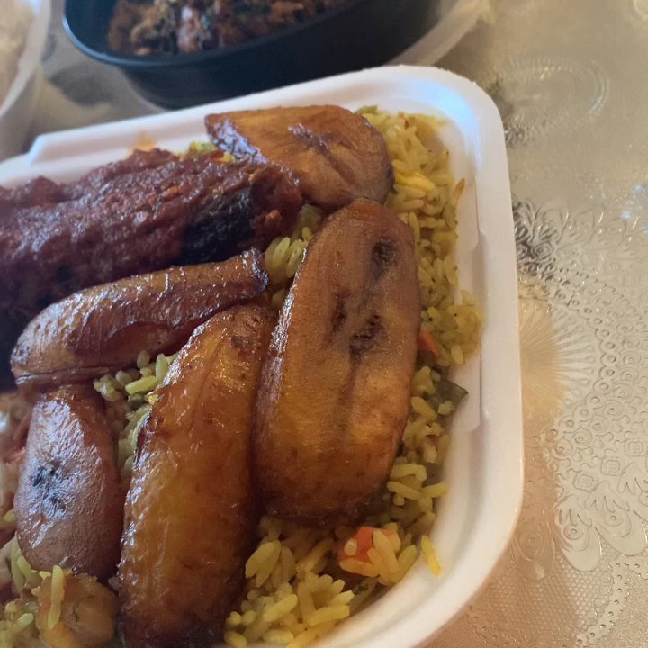 Intercontinental Restaurant - Fried Rice w/fish meal and Egusi Stew w/ Fufu. Due to covid precautions food is served in disposables. Still very delicious! - African Near Me - Columbus, Ohio