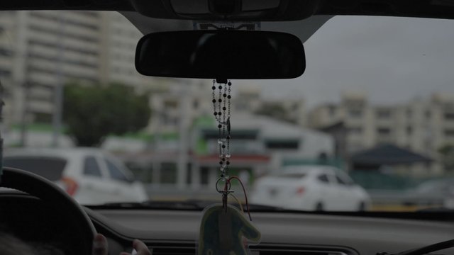 A person driving around Panama City