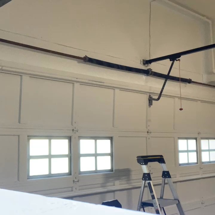 Vertical Garage Doors Services - Remove old springs - Garage Door Services Near Me
