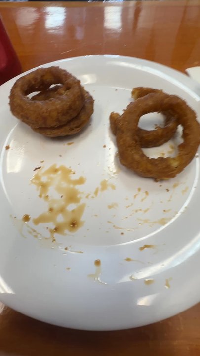 FBI Burger - The left over oil that was coming off the onion rings... - Burgers Near Me - Novato, California