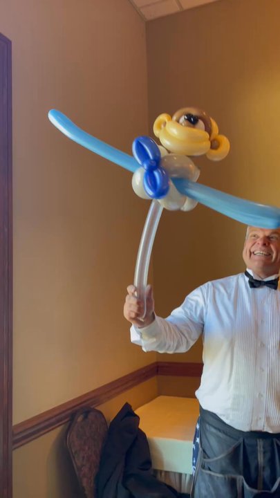 Party Magic Entertainment - monkey balloon riding an airplane - Party & Event Planning Near Me - West Milford, New Jersey