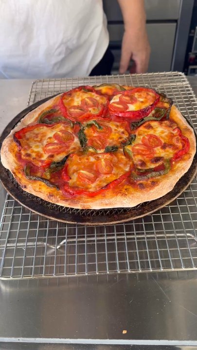 Meganiko's - Right out of the oven! - Pizza Near Me - TRIPLER AMC, Hawaii