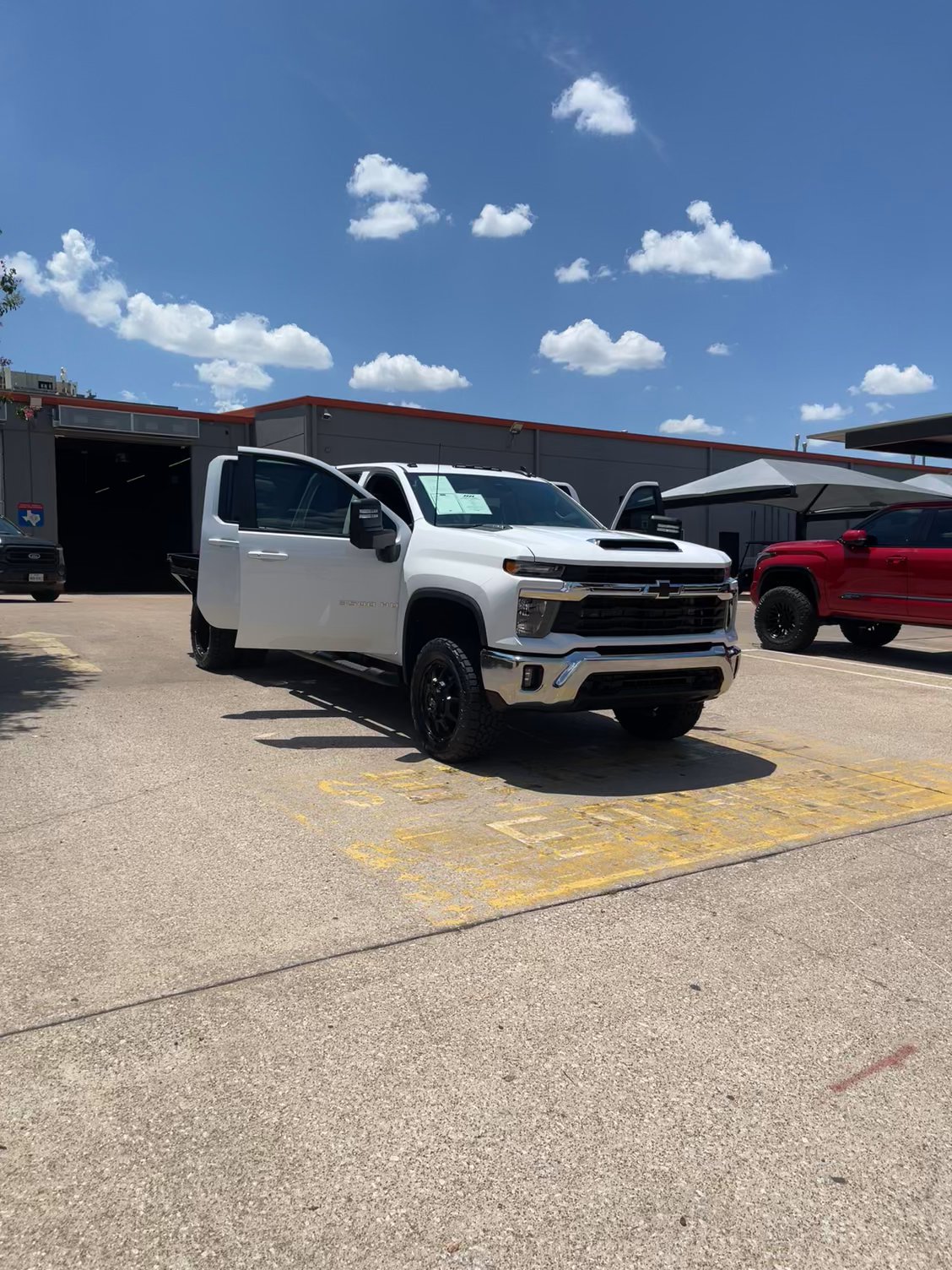 Lifted Trucks - #TX10220 - 2025 Chevrolet Silverado 3500HD CC LT Chassis Crew Cab