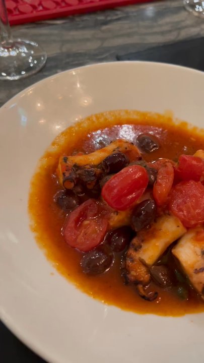 Sotto Sotto - POLPO ALLA PUTTANESCA Grilled octopus served with cherry tomatoes from Pachino, black olives, anchovies and capers from Pantelleria - Italian Near Me - Oakville, Ontario