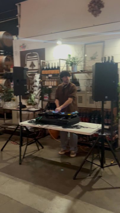 The Austin Winery - DJ spinning at the winery - Wine Tasting Room Near Me - Austin, Texas