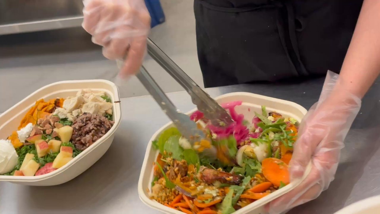 sweetgreen - Healthy Salads, Wraps, and Bowls - Mixing the salad - Salad Near Me - Boston, Massachusetts