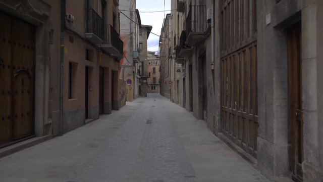 Walking down a street in Spain