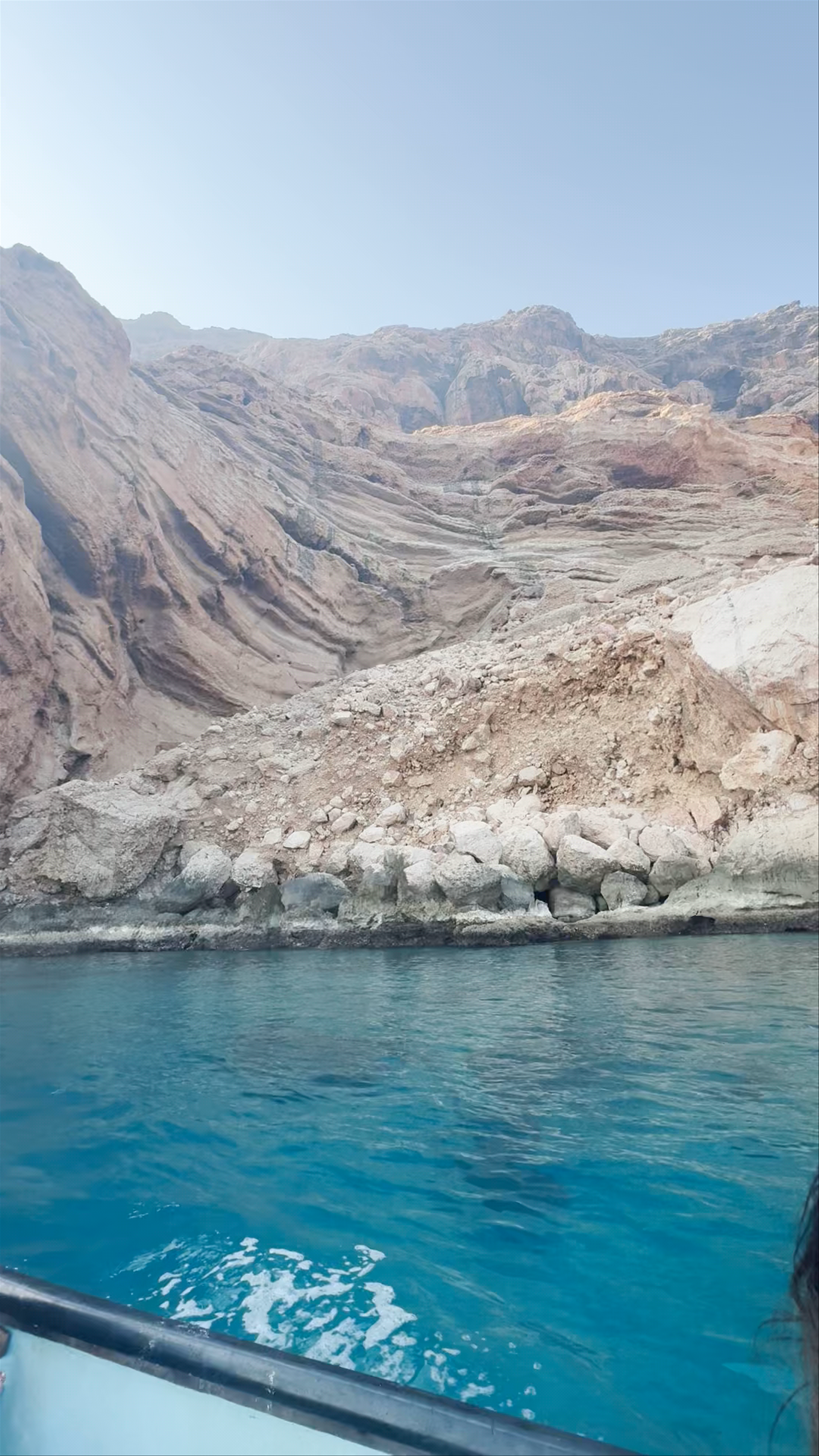 Mystical Dolphin Waters and Dramatic Cliffs of Dolphins Gulf, Qalansiyah
