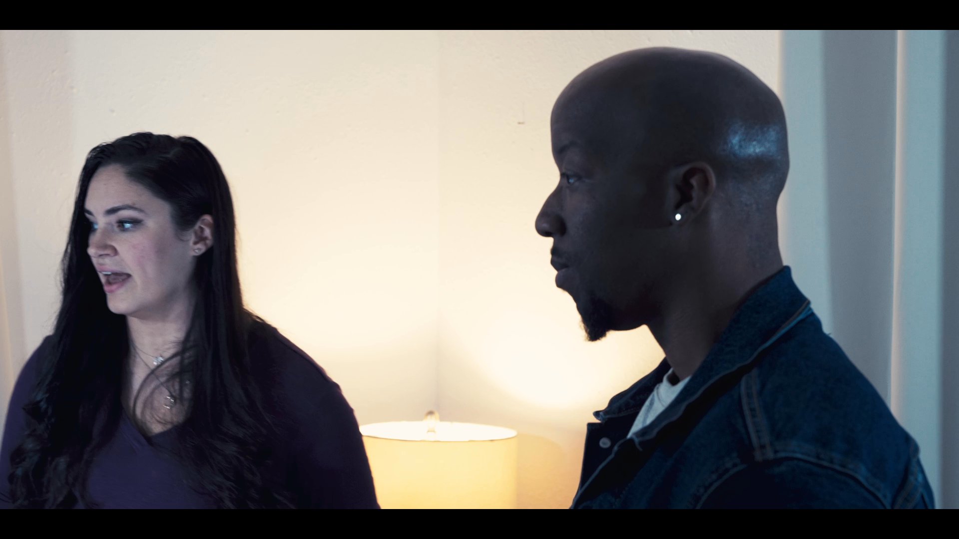 Individuals engage in focused dialogue and interpersonal interaction within an indoor studio environment. The scenes depict varying perspectives of actors performing character-driven dramatic sequences.