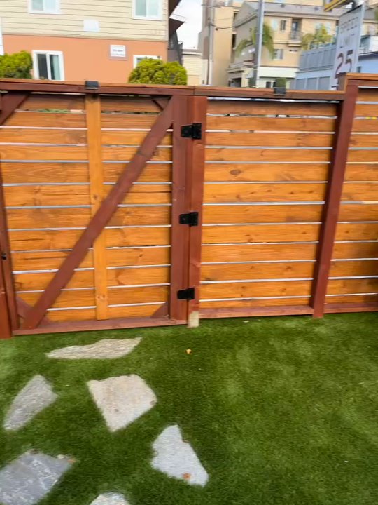 Welding Gates - Enclosed fence stained - Fences & Gates Near Me