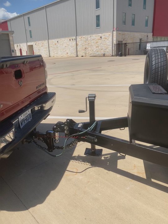 Diamond D Rentals - this is the trailer hooked up and they give you a code for the drop box with the keys in it also the trailer has a winch. also the straps - Trailer Rental Near Me