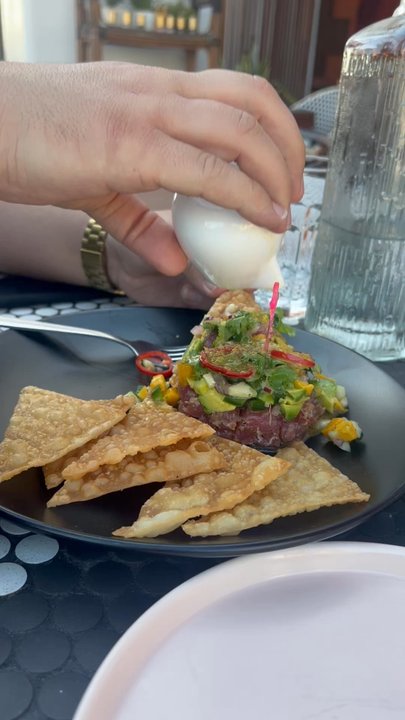 Flamingo Deck - Yuzu sauce on top of the tuna stack. - New American Near Me - San Diego, California