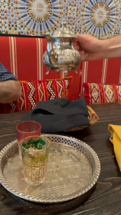 Casablanca - The best waiter pouring their mint tea. Omg so very satisfying!!! Dinner and a show!! He's the best!! TY! - Moroccan Near Me - East Brunswick, New Jersey