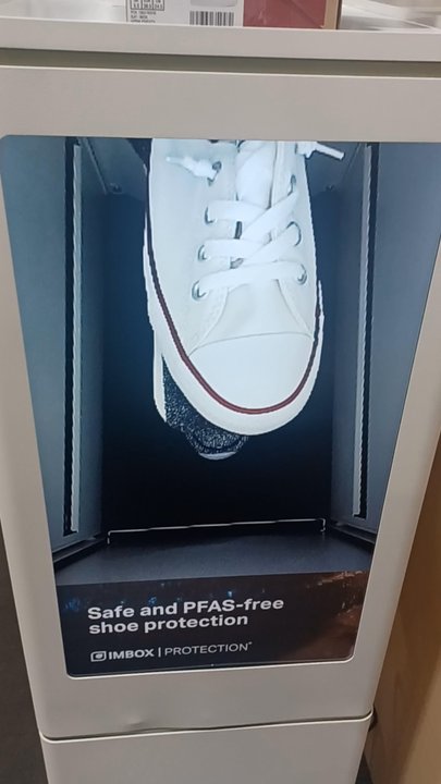 DSW Designer Shoe Warehouse - Shoe protection being sprayed onto white converse - Shoe Stores Near Me - Torrance, California