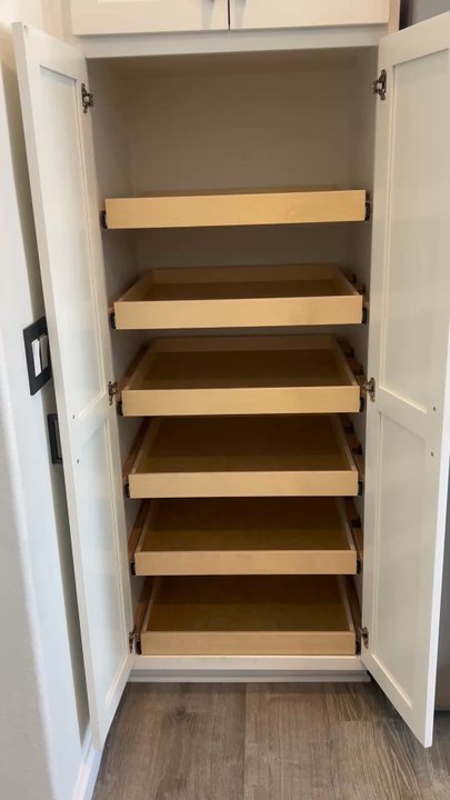 Cabinets Organized by Handle It - Pull out shelves in the kitchen - Cabinetry Near Me
