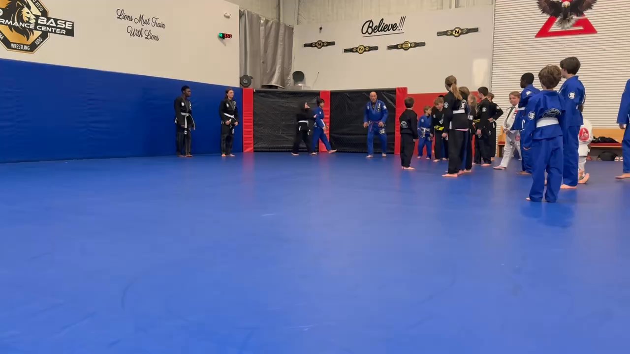 Solid Base Performance Center - 64yr old snd and an 11yr old dominating a diving front roll - Martial Arts Near Me - Green Cove Springs, Florida