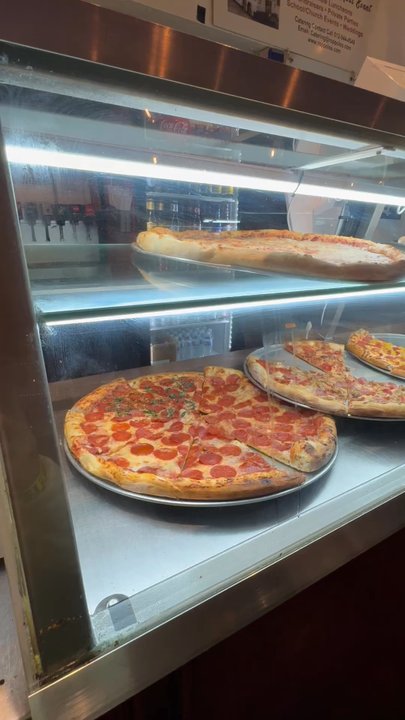 Roppolo's Pizzeria - Pizza slices - Pizza Near Me - Austin, Texas