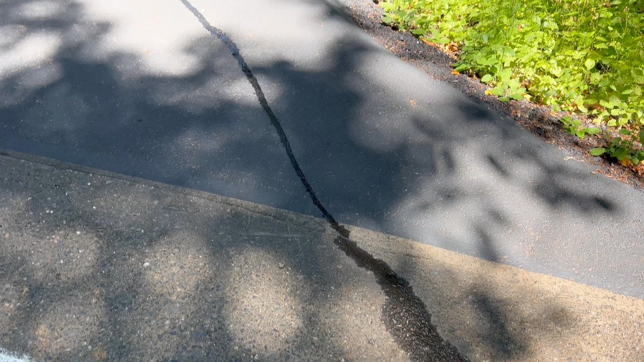 KNL Industries - Mess of seal coat left on my beautiful driveway entrance. - Masonry/Concrete Near Me - Canby, Oregon