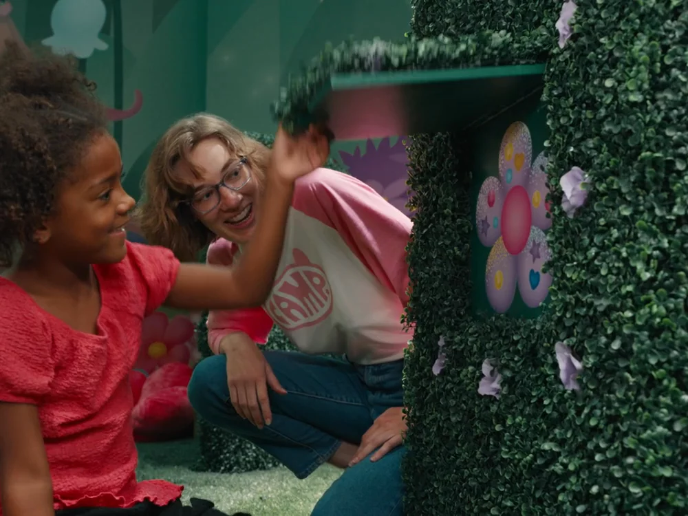 Video showing children playing inside Gabby's Dollhouse X CAMP