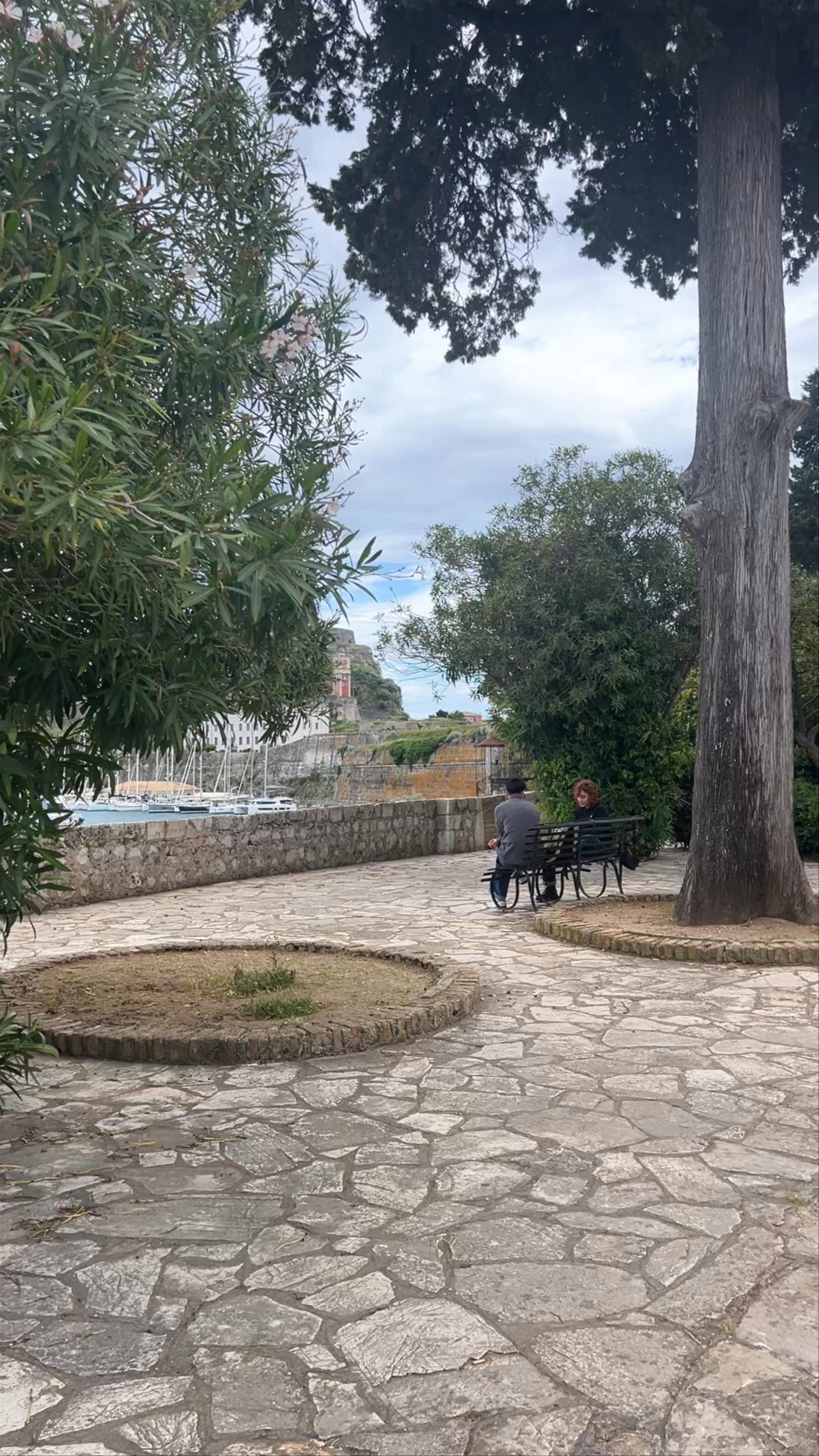 Serene Stroll in Faliraki, Corfu: Historic Charm and Coastal Calm