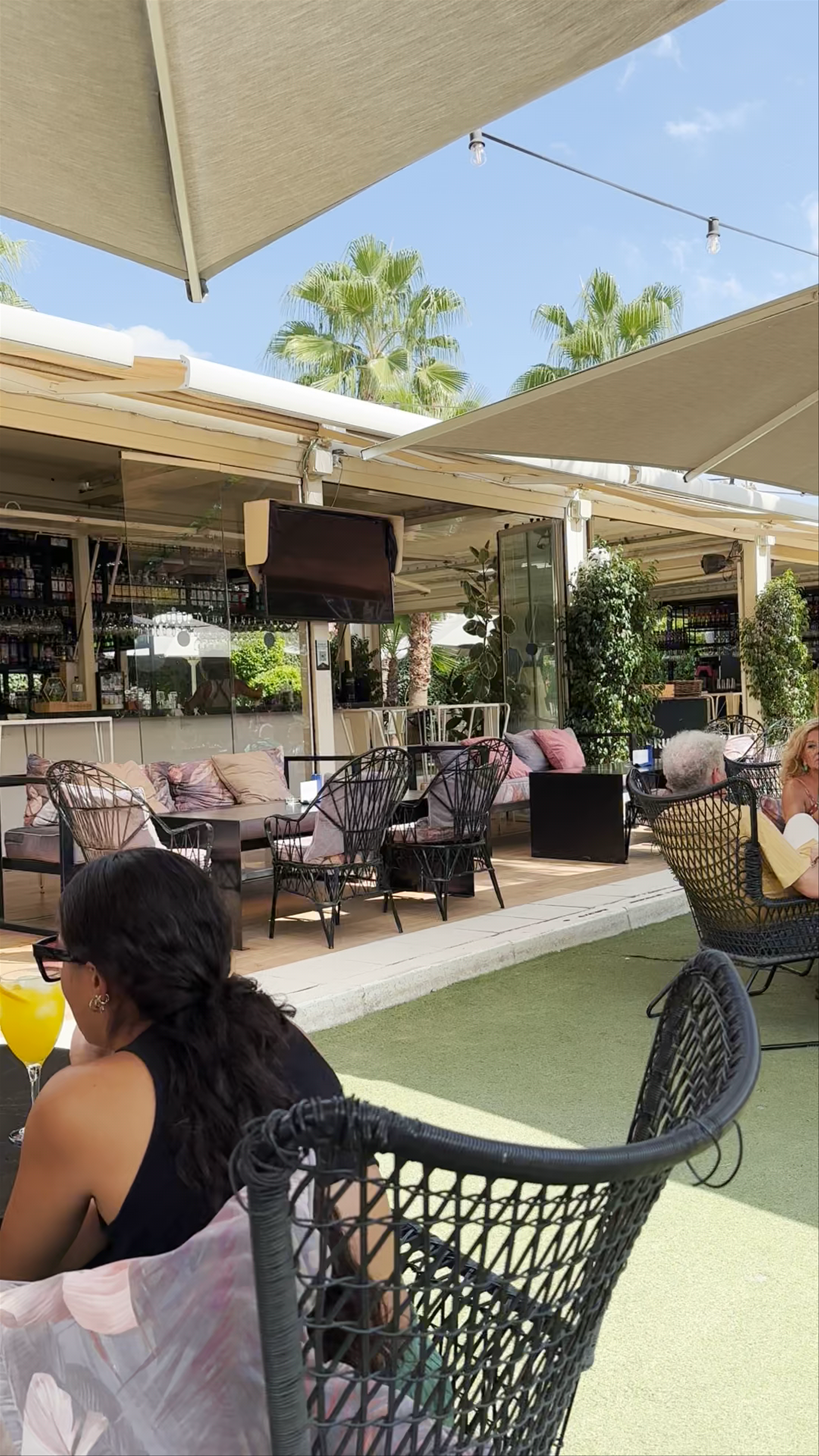 Sunny Outdoor Patio Vibes at Mercado Lonja del Barranco, Seville
