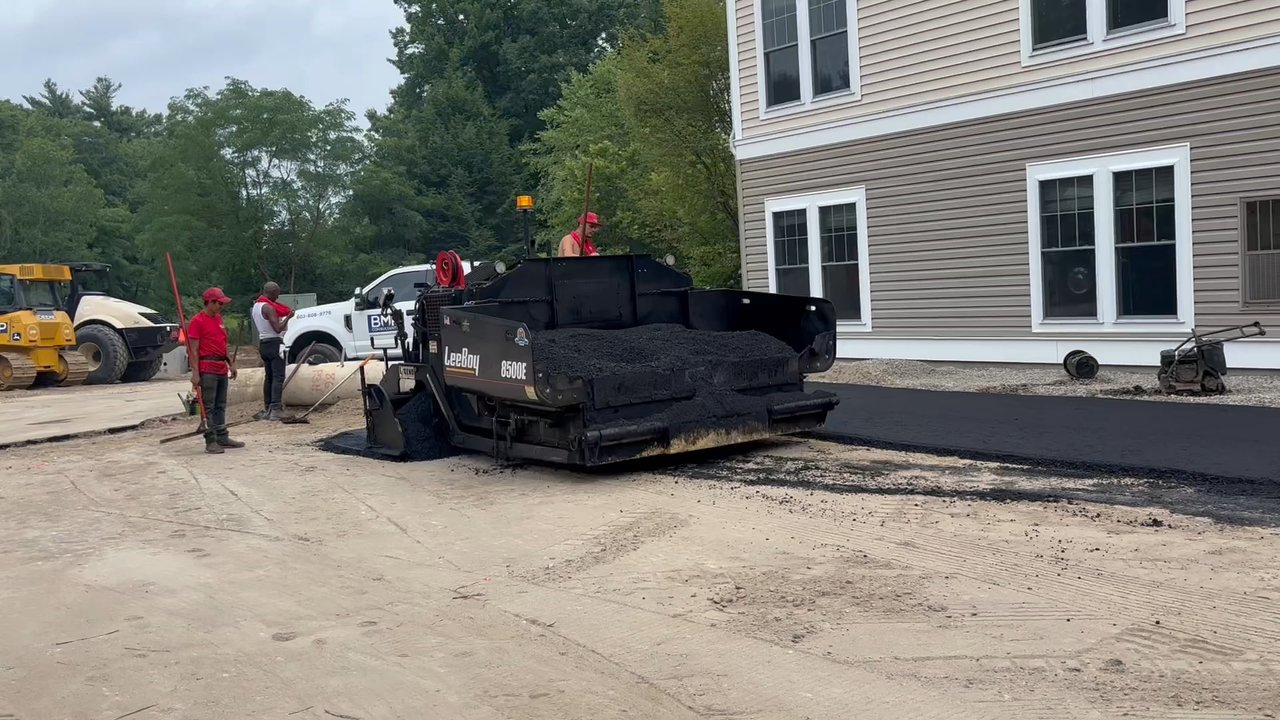 American Asphalt Paving - Applying the asphalt base course - General Contractors Near Me - Hooksett, New Hampshire