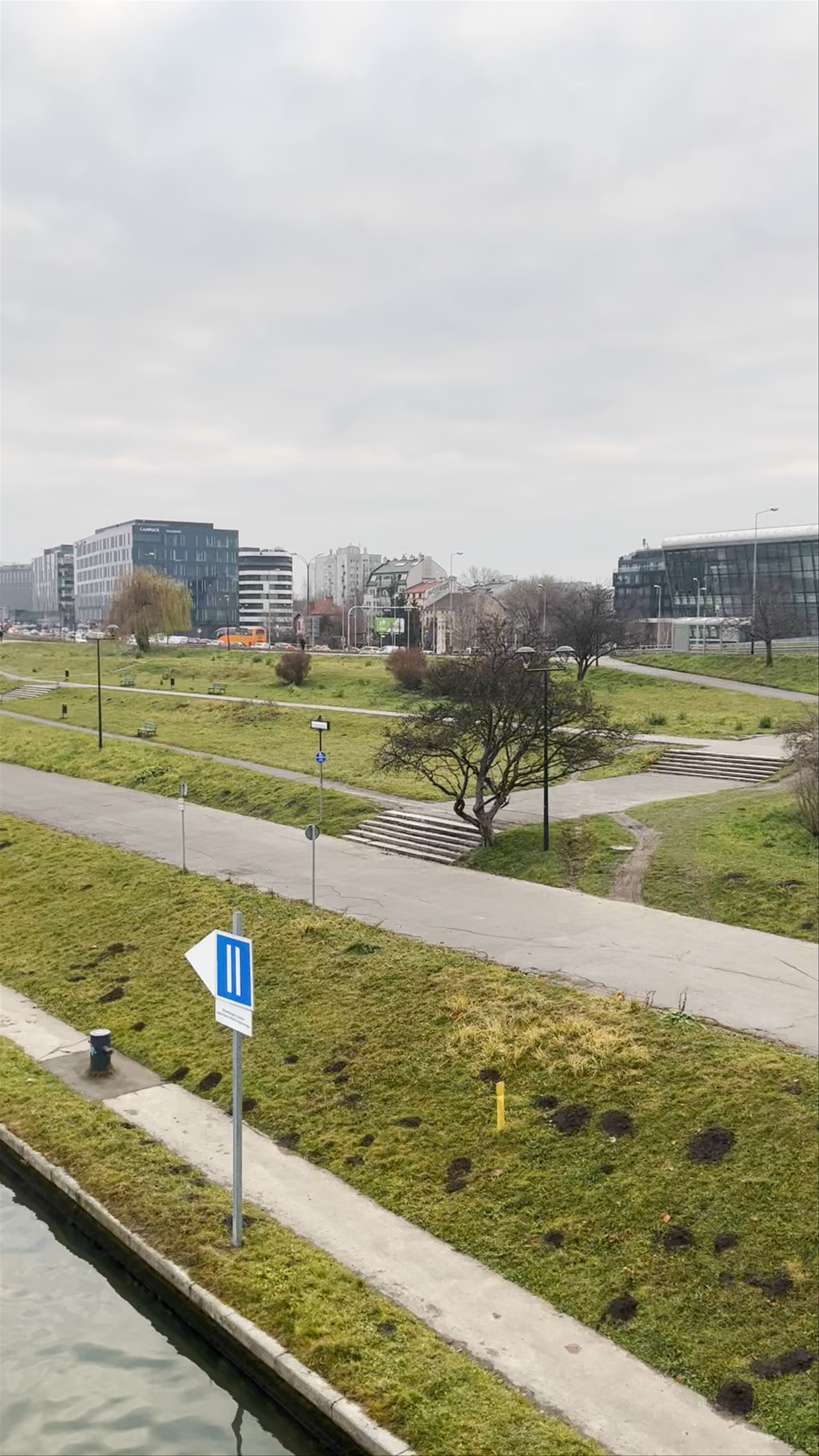 Scenic Riverside and City Views at Bulwar Wołyński, Kraków