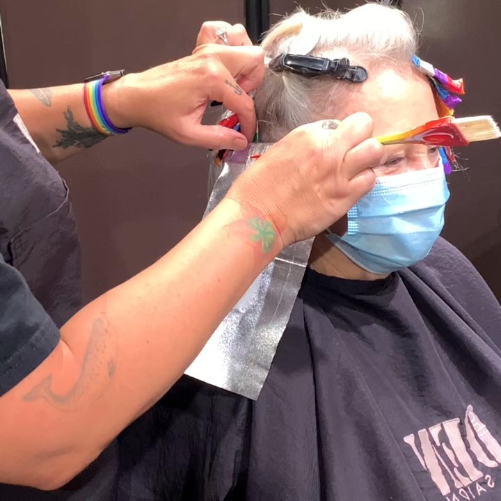 The Den Salon - Check out the cool new rainbow foils the Meredith is using on her client yesterday - Hair Salons Near Me - Long Beach, California
