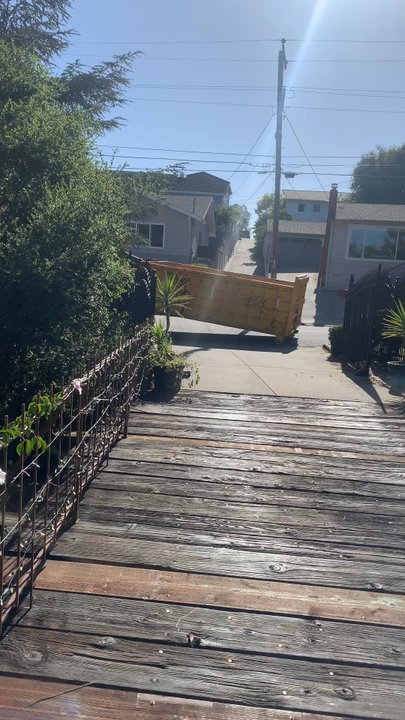 Simple Rentalz - Dumpster being delivered - Portable Toilet Services Near Me