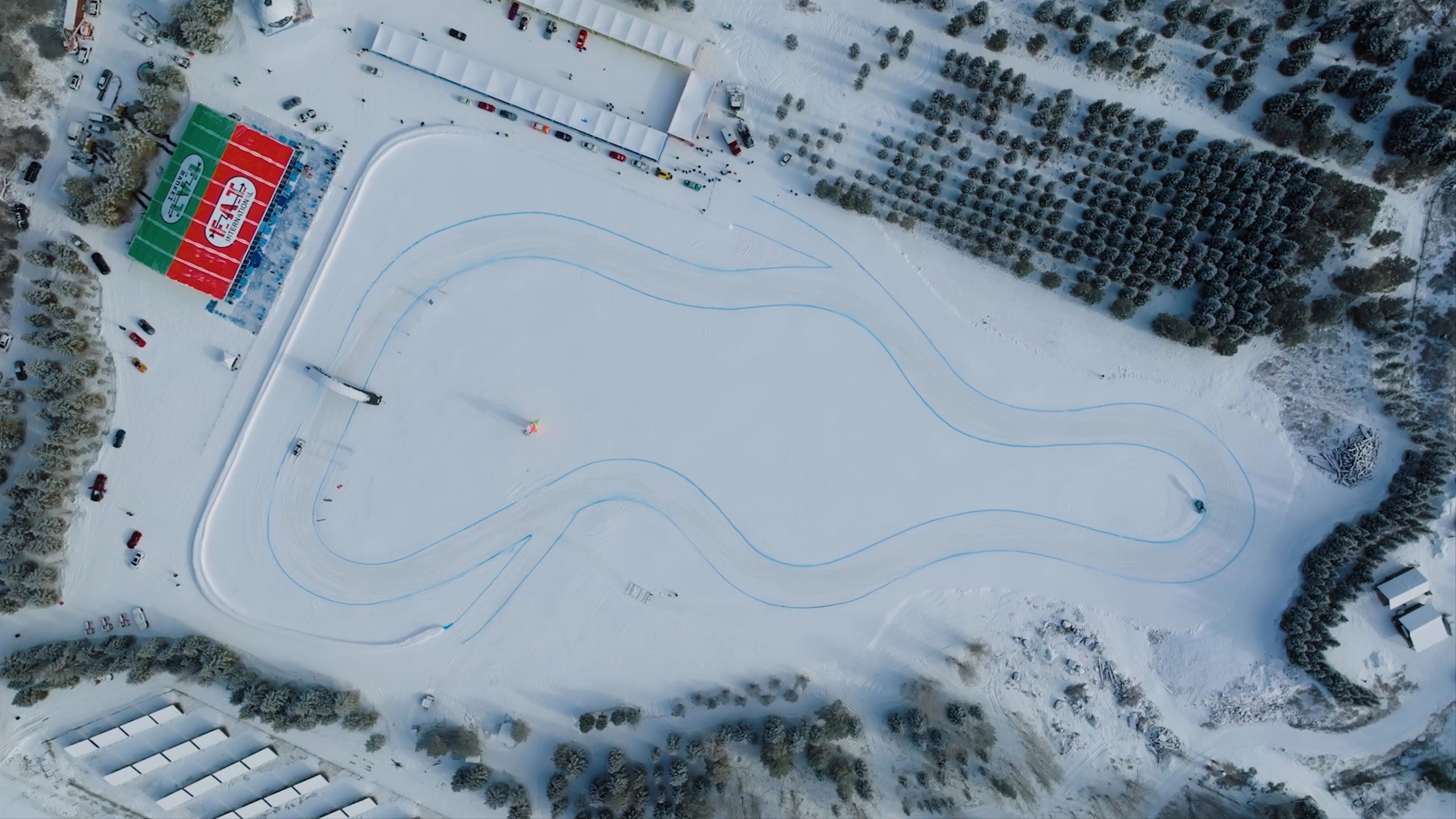 Aerial view of F.A.T. ice race course with cars driving on it