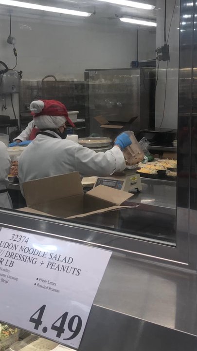 Costco Wholesale - Leveling the pie filling with the bottom of the pitcher, not a sanitary practice, They should use a Spatula. - Wholesale Stores Near Me - Wheaton, Maryland