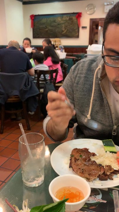 Pho Bang Restaurant - This is the waiter that gave me 3 empty plates. I ordered for three orders of pork chop over rice. - Vietnamese Near Me - Flushing, New York