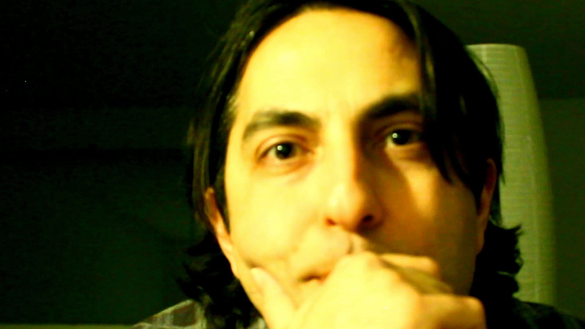 A man and a woman engage in a remote video call, maintaining eye contact and responding to one another throughout the conversation.