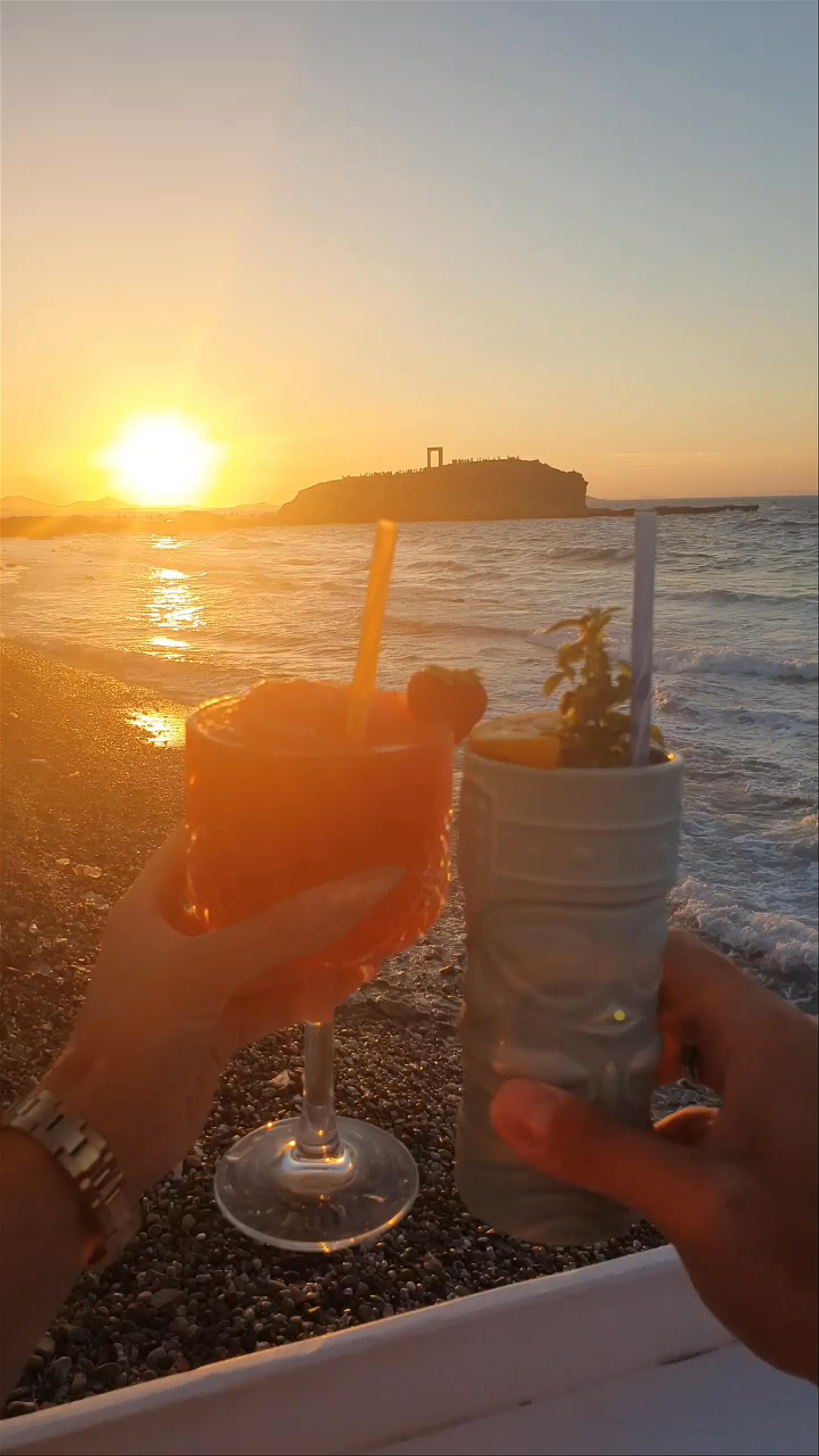 Sunset Cheers at Riviera Town Beach, Naxos, Greece