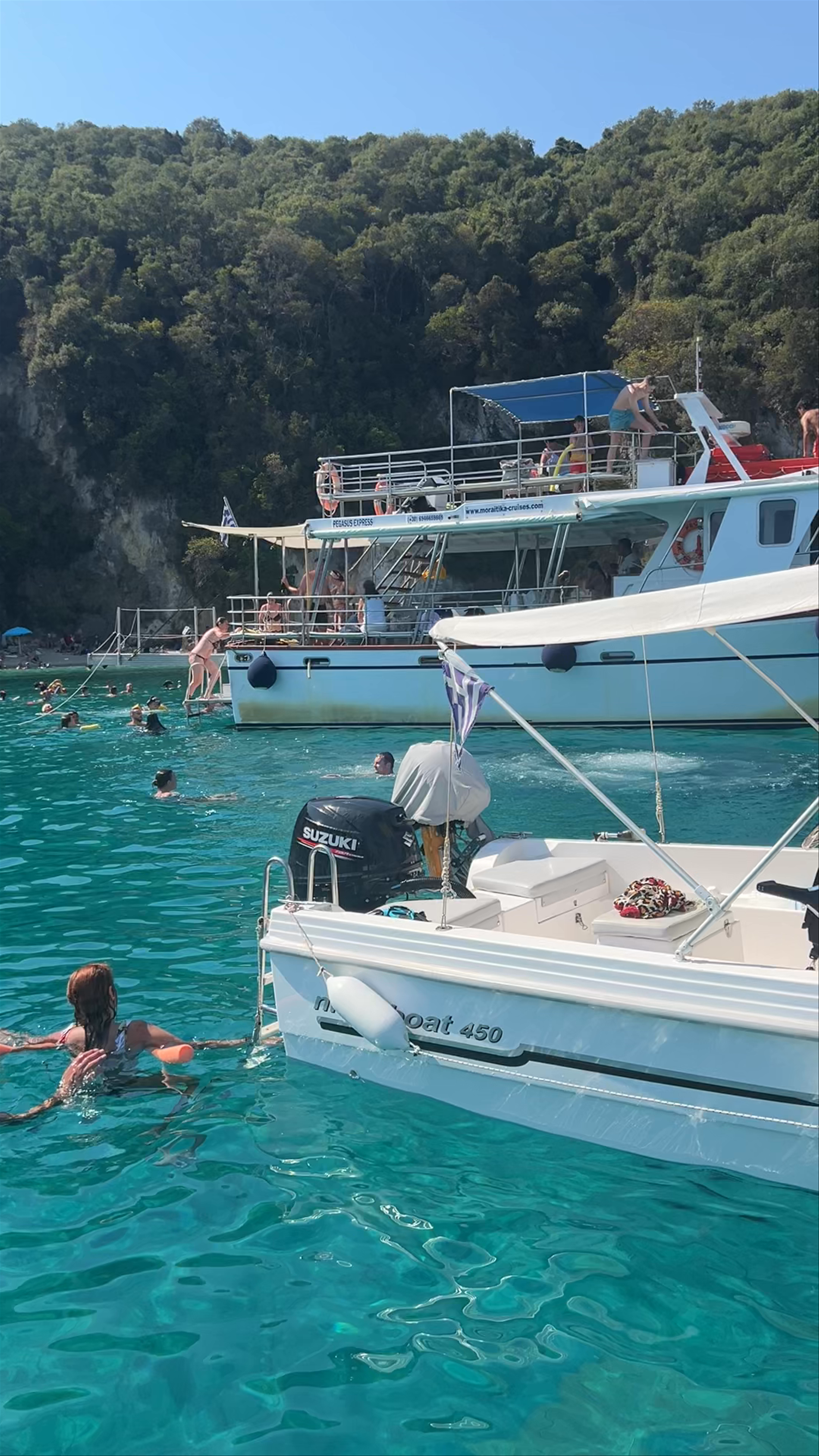 Crystal Clear Waters and Boat Vibes at Pisina Beach, Syvota, Greece