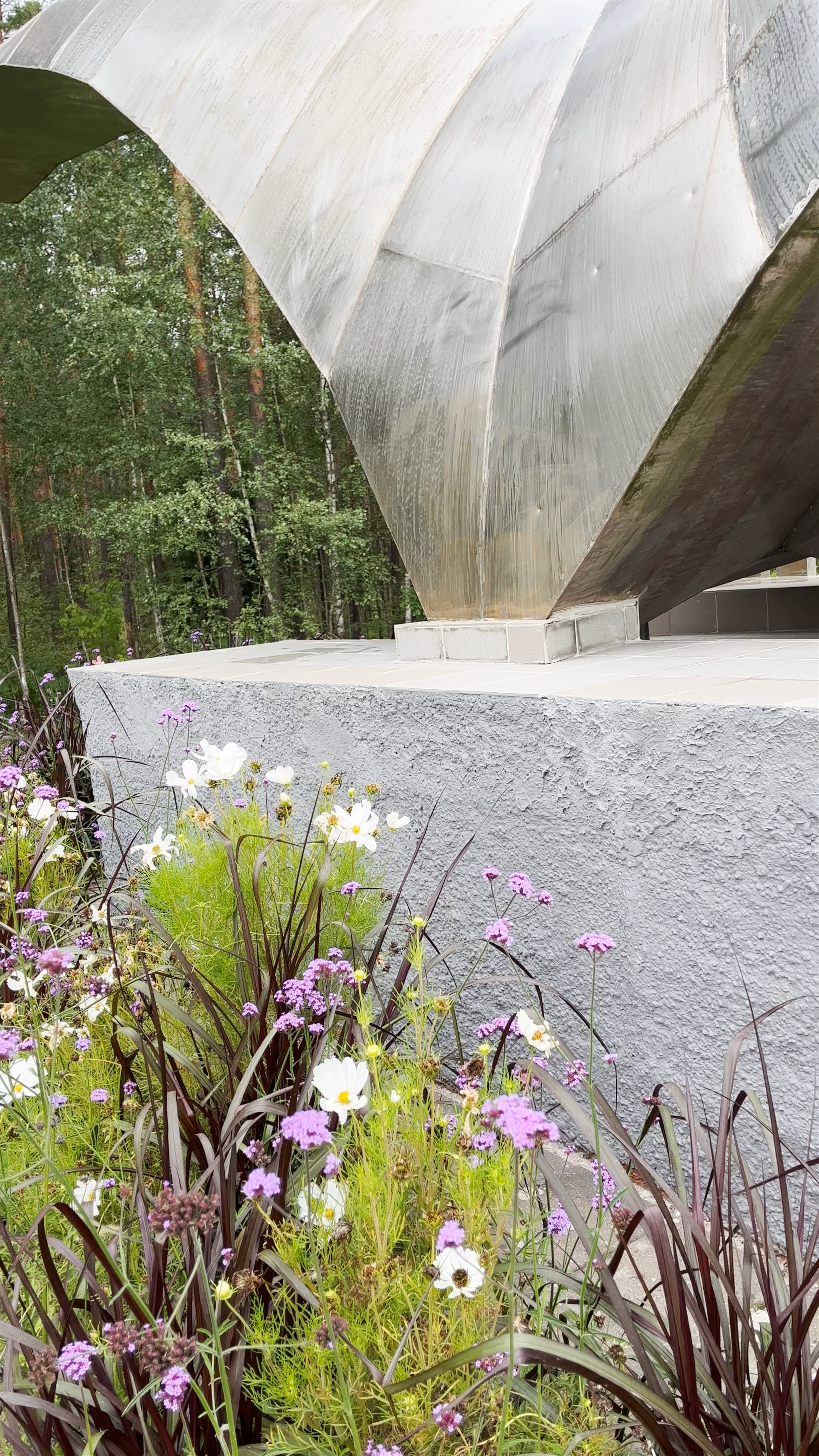 Steel Sculpture Amidst Serene Forest in Daugavpils, Latvia