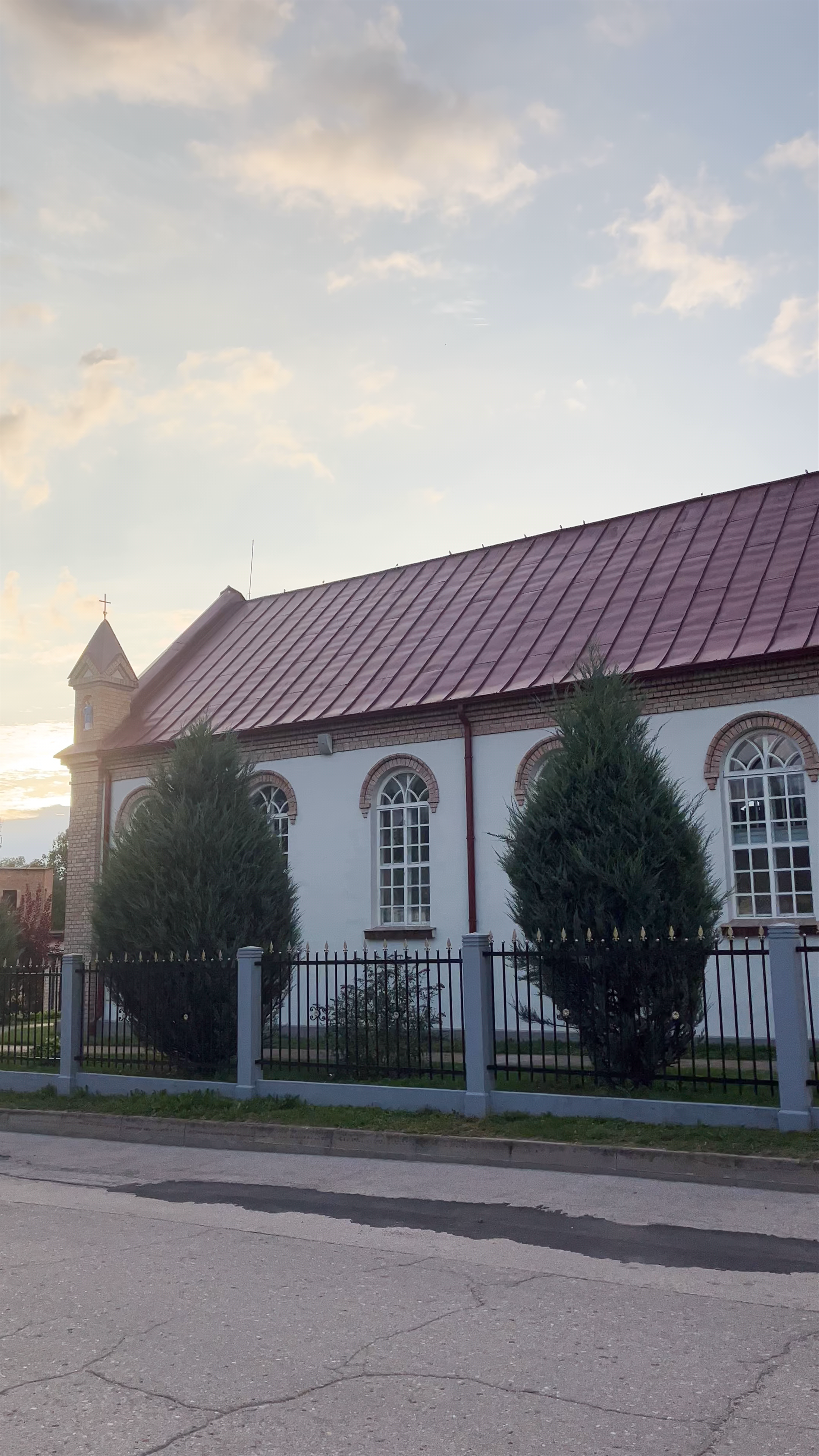 Bauskas Vissvētākā Sakramenta Roman Catholic Church at Sunset