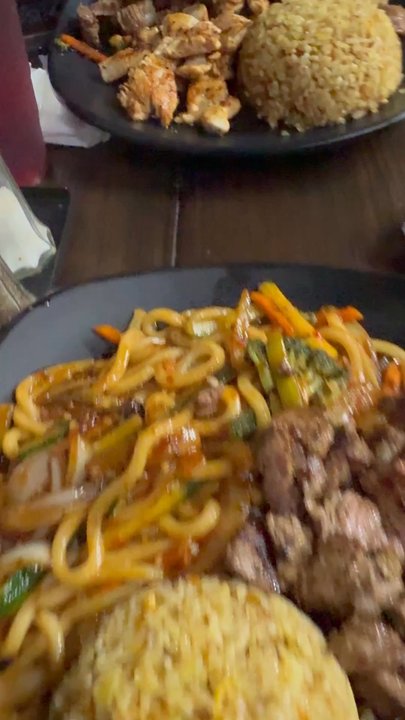 MexiHibachi - You'll see the spicy noodles with New York steak and the plate in front of me is a trio, chicken steak, and shrimp - Teppanyaki Near Me - Pinole, California