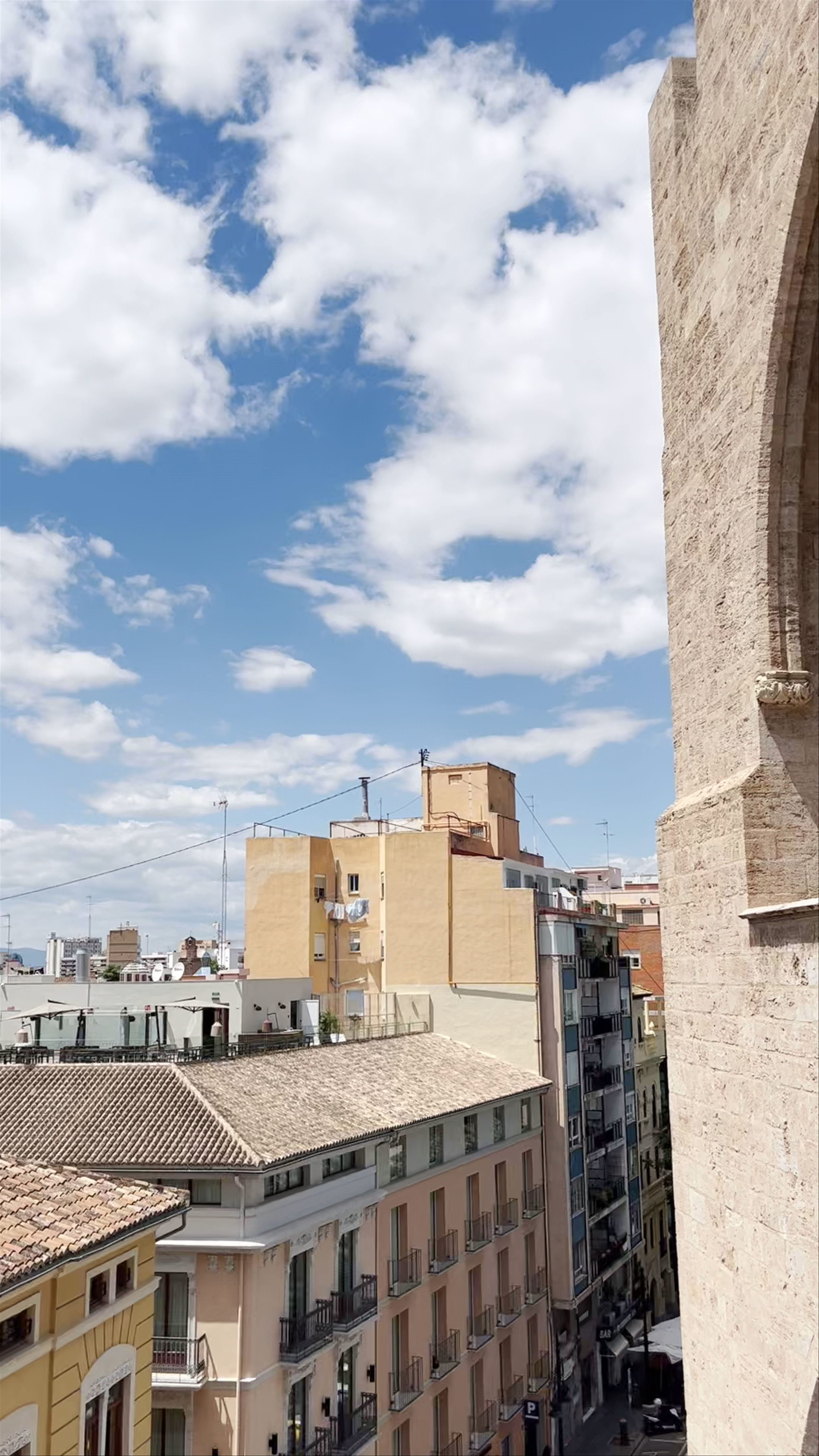 Sunlit Rooftop Views of Torres de Serranos & València Cityscape