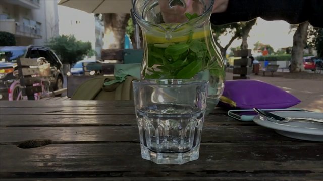Pouring a glass of water