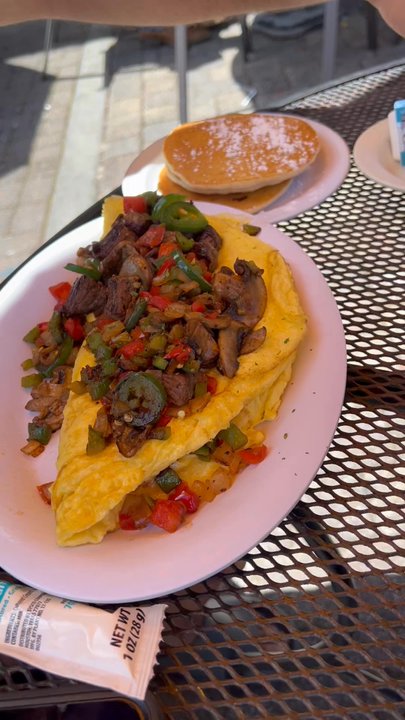 The Pancakery - Video highlighting food to include two omelettes and mini pancakes - Breakfast & Brunch Near Me - Destin, Florida