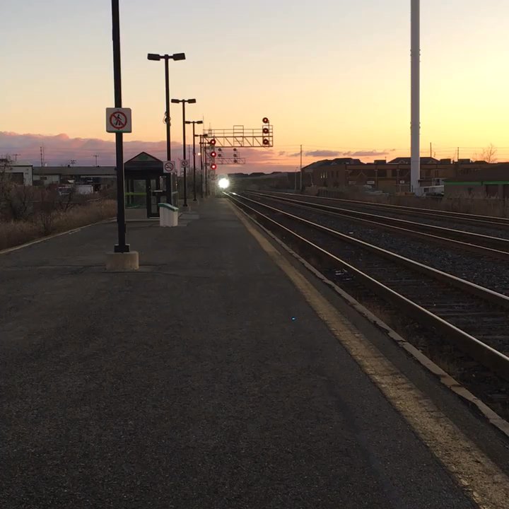 Milton GO Station - Train coming into the station. - Public Transportation Near Me - Milton, Ontario