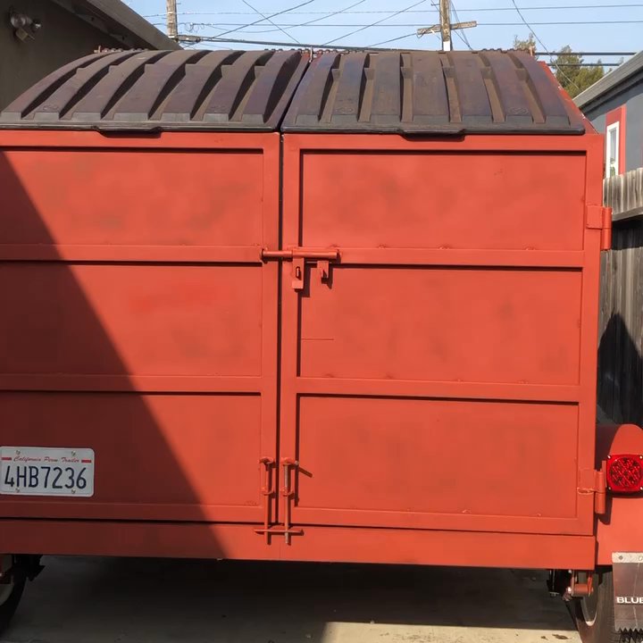 Mini Dumpster Rental - Backing up into Drive Way - Dumpster Rental Near Me