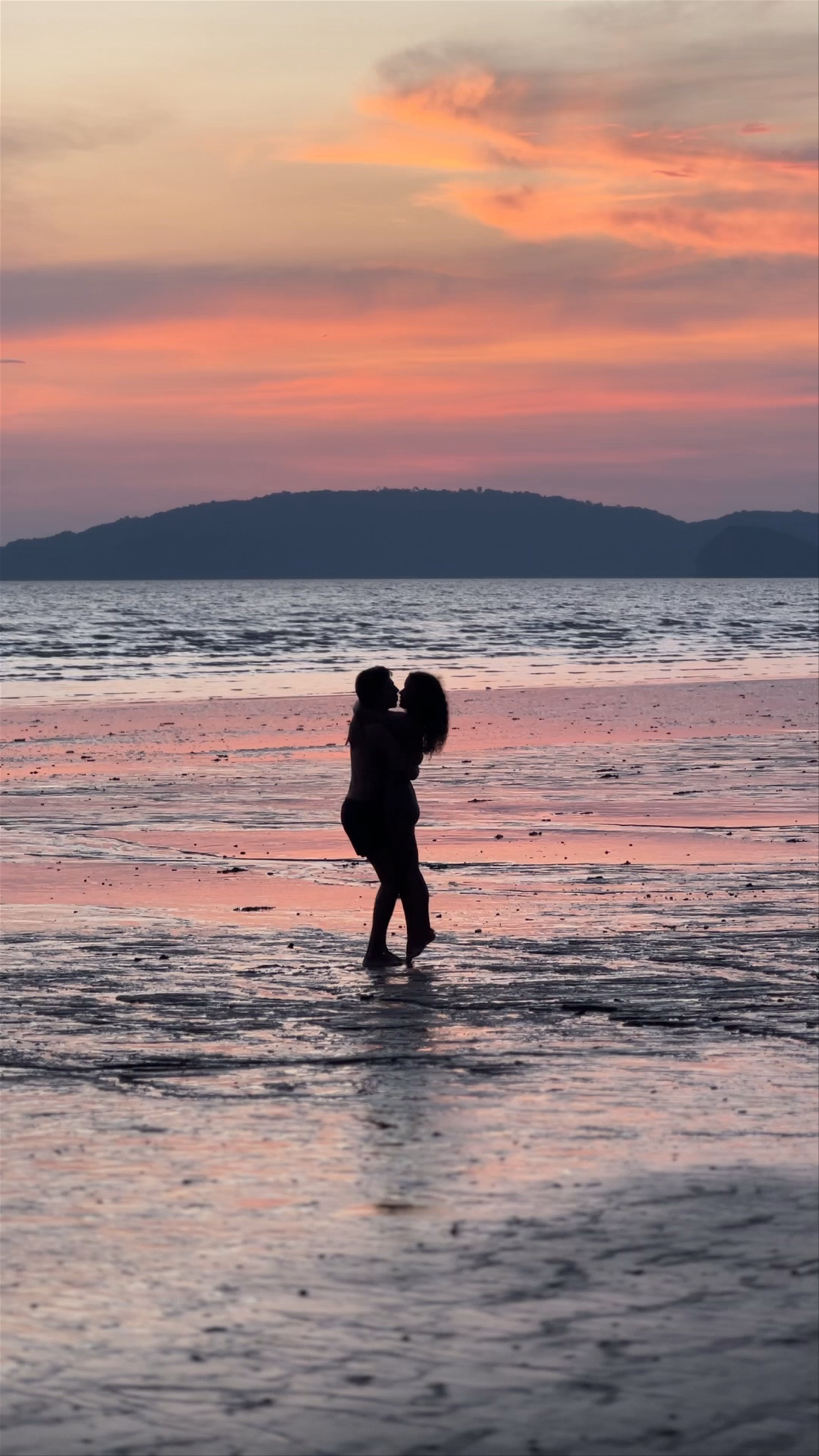 Romantic Sunset Embrace at Ao Nang Beach, Thailand