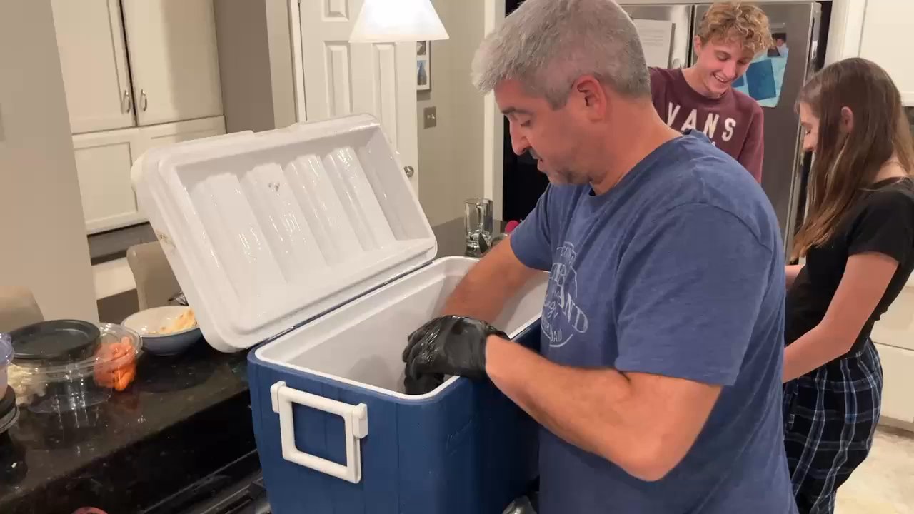 Justin’s Poolside Grill - Chef showing us the pulling of the pork. - American Near Me - Montgomery, New Jersey