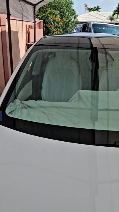 Miami Auto Tinting - mobile window tinting Before & after of a Tesla Model 3 windshield tinted with 70% ceramic film. - Home Window Tinting Near Me - Miami, Florida